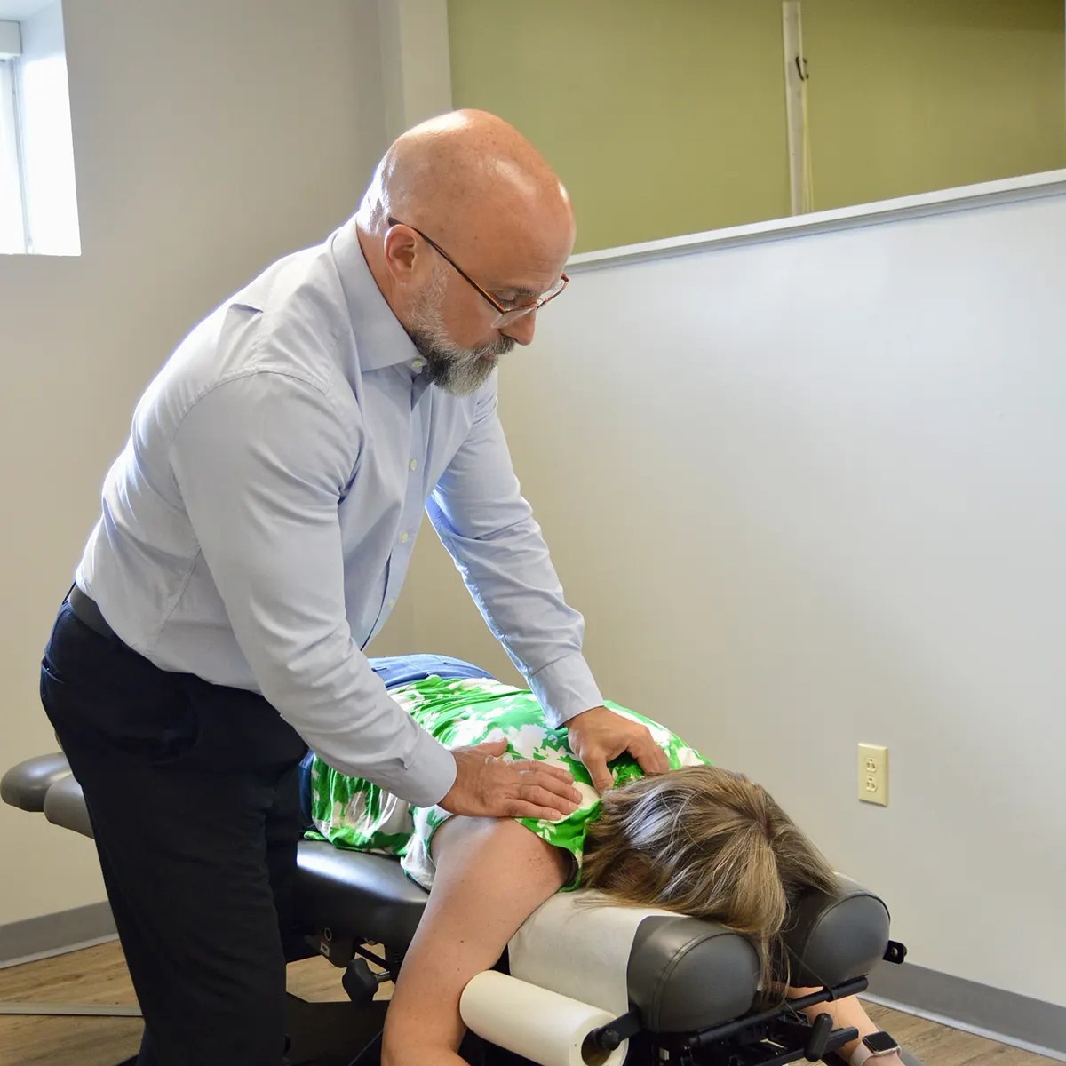 Chiropractor Adjusting Patient Allison Park PA Near Me
